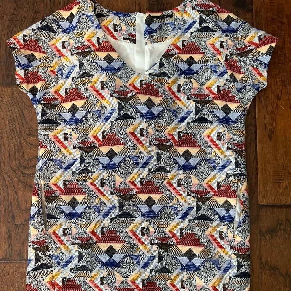 FRNCH tribal print sheath with pockets . Gorgeous woven fabric. Size 6 .